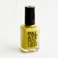 Sage: A bottle of nail polish in chartreuse.