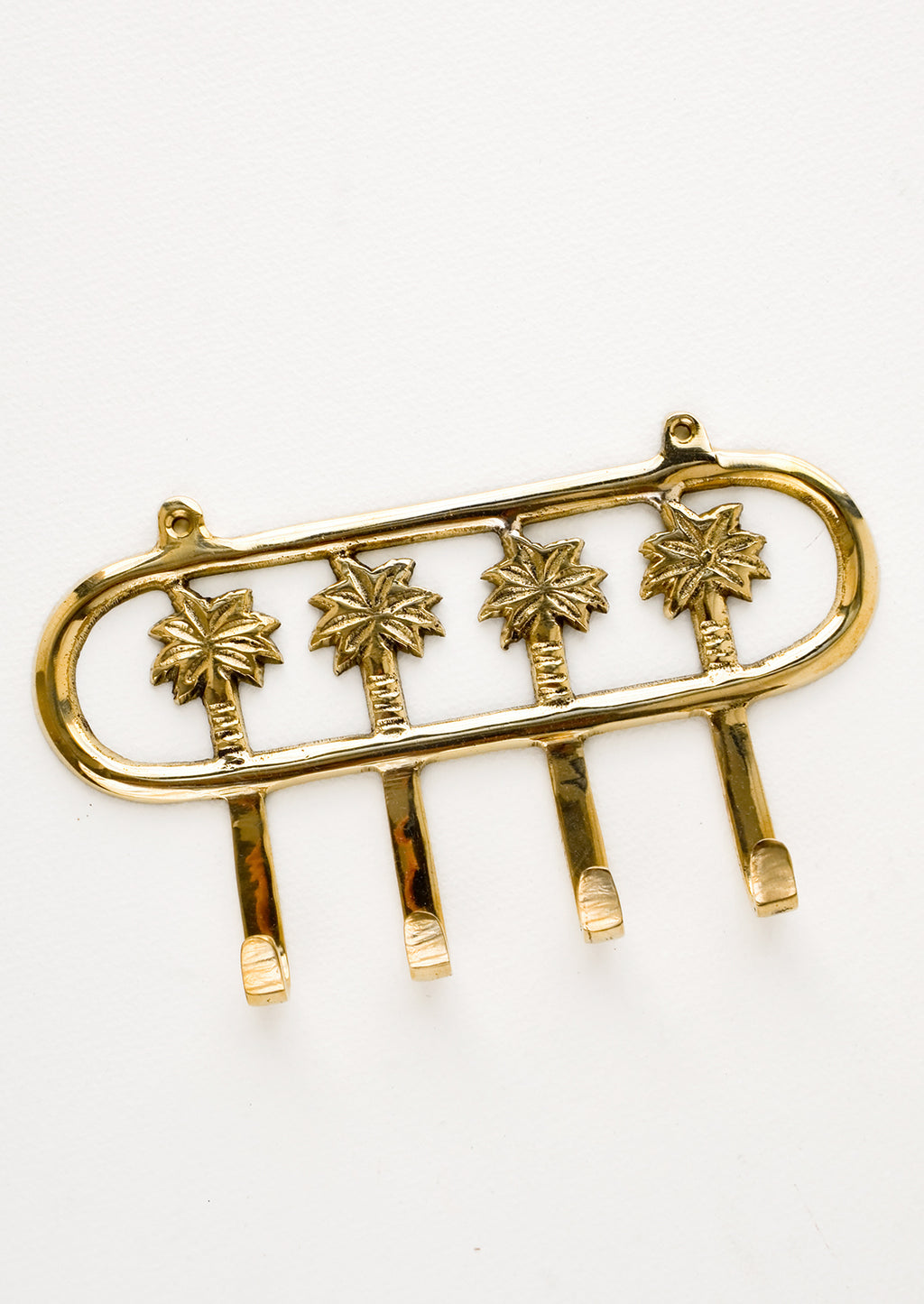 1: Wall mountable hook rack with 4 palm trees extending into hooks, made in brass