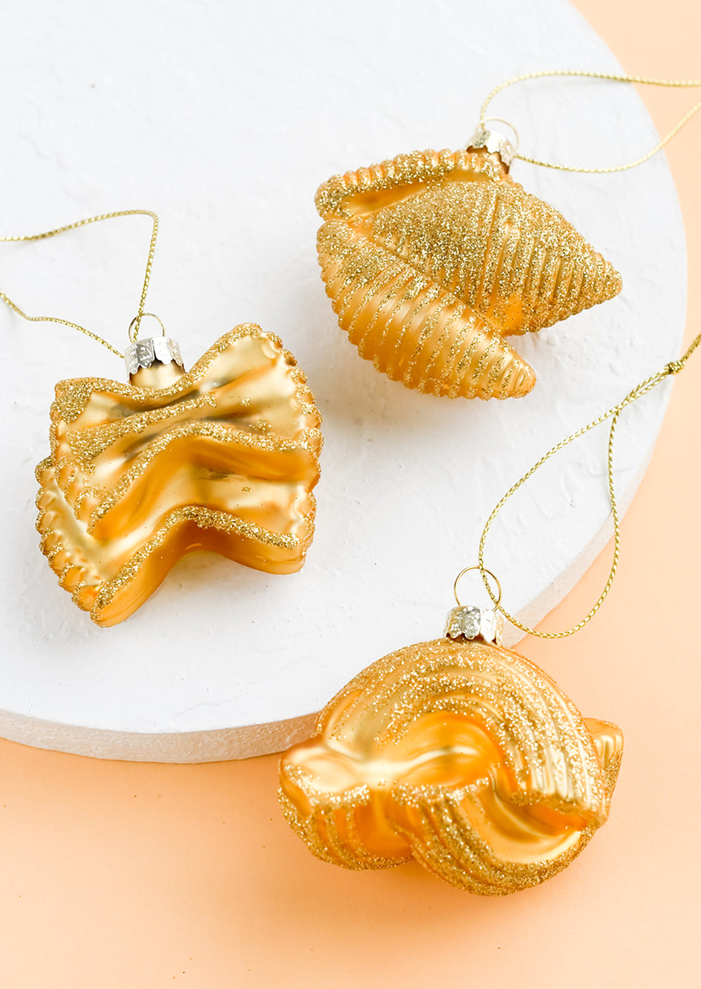 1: Glass ornaments in the shape of pasta.