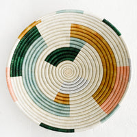 1: A round woven sweetgrass bowl viewed from above.