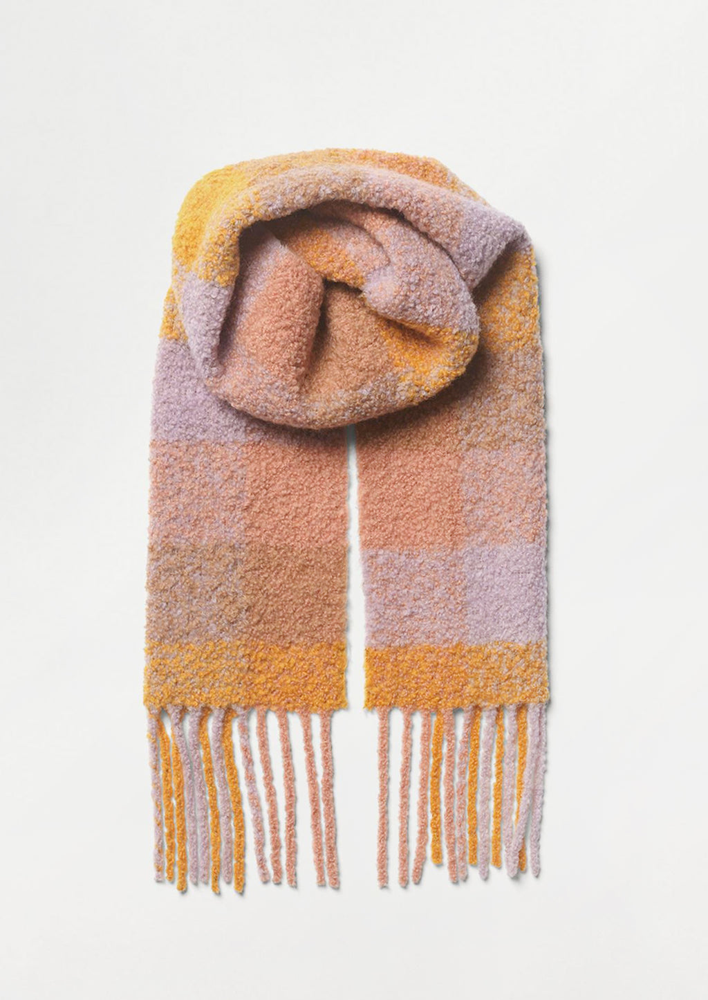 2: A teddy textured scarf in pastel check print.