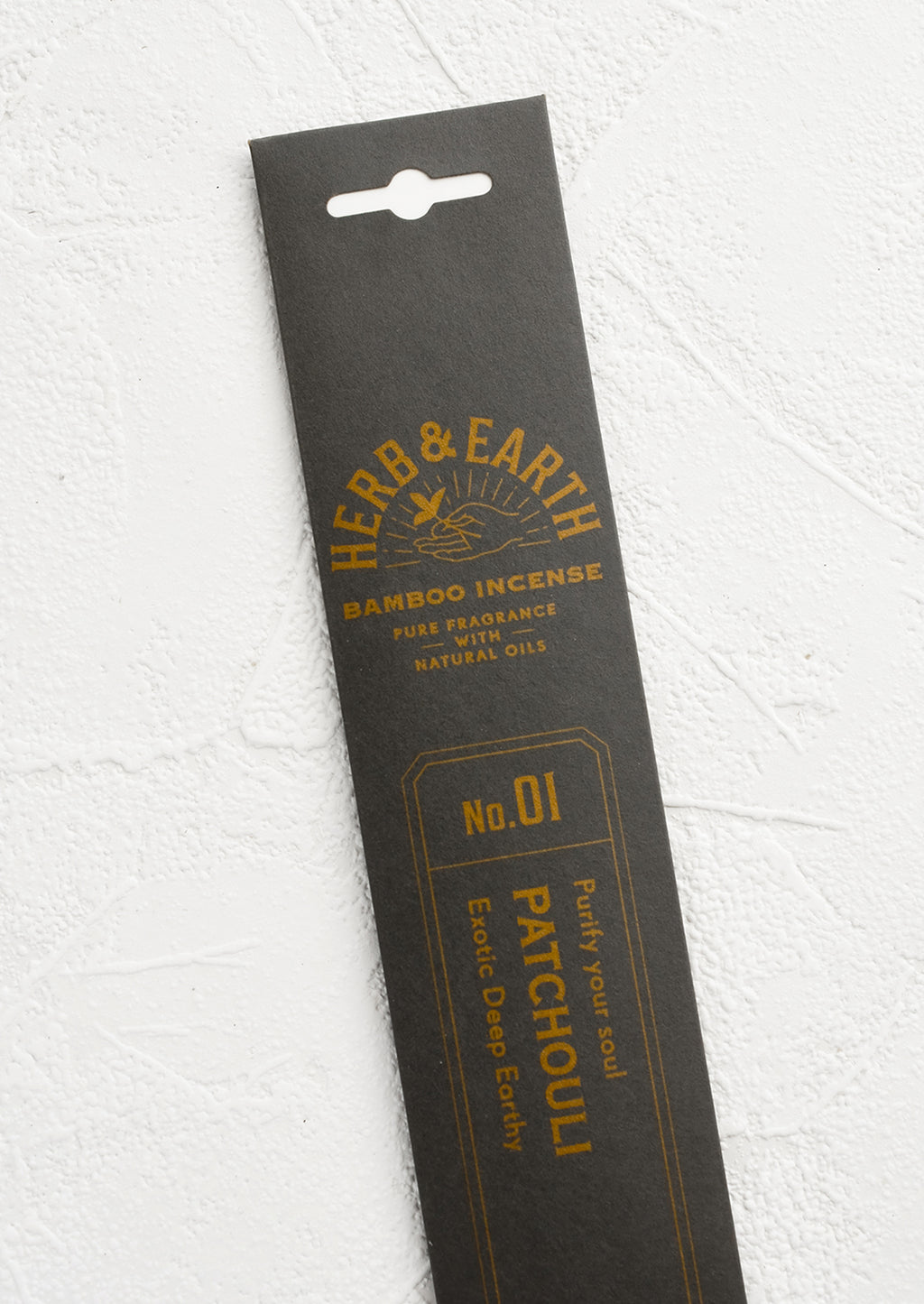 Patchouli: A dark grey packaging sleeve containing patchouli scented incense.