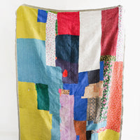 1: Vintage patchwork quilt in a colorful mix of fabrics. All different shades of green, blue, red & more.