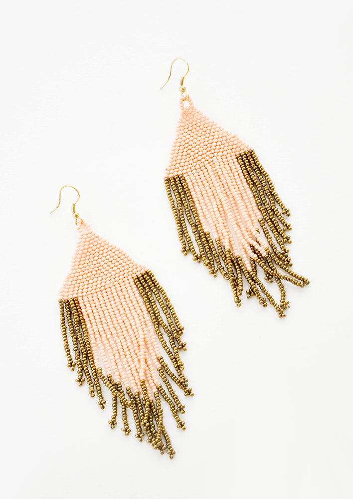1: Dangling earrings with peach and gold beaded fringe.