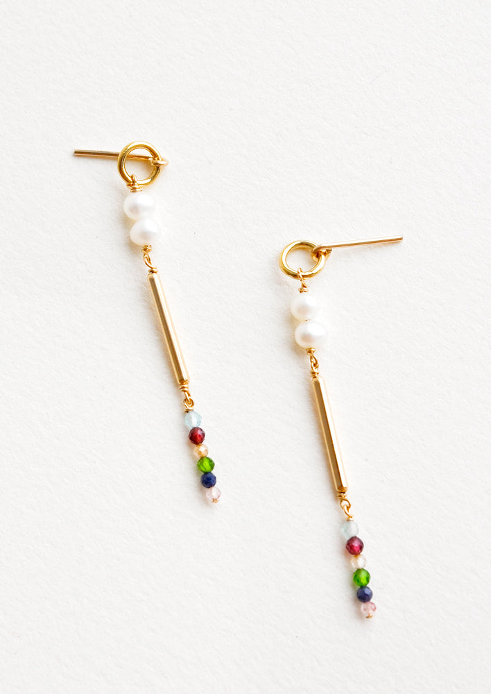 3: Dangling earrings featuring a small circle, two pearl beads, a gold post and six small multicolor gemstones on a yellow gold post back.