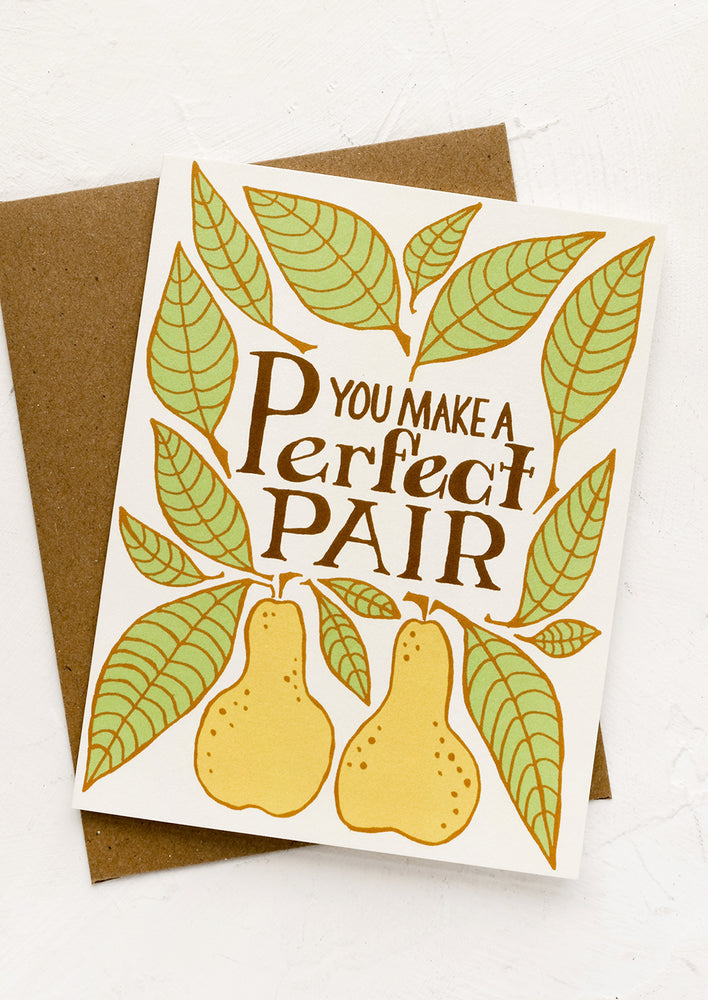 A greeting card reading "You make a perfect pair" with image of pears.