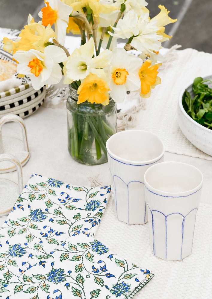 A table top scene featuring cups.