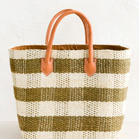 1: A raffia tote in olive and cream gingham with leather handle.