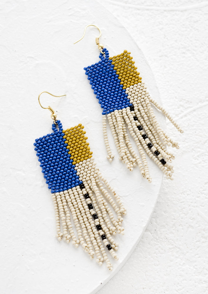 Beaded earrings with colorblock design and fringe.
