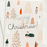 2: A greeting card with animals surrounded by pink Christmas trees and silver text reads "Merry Christmas!".