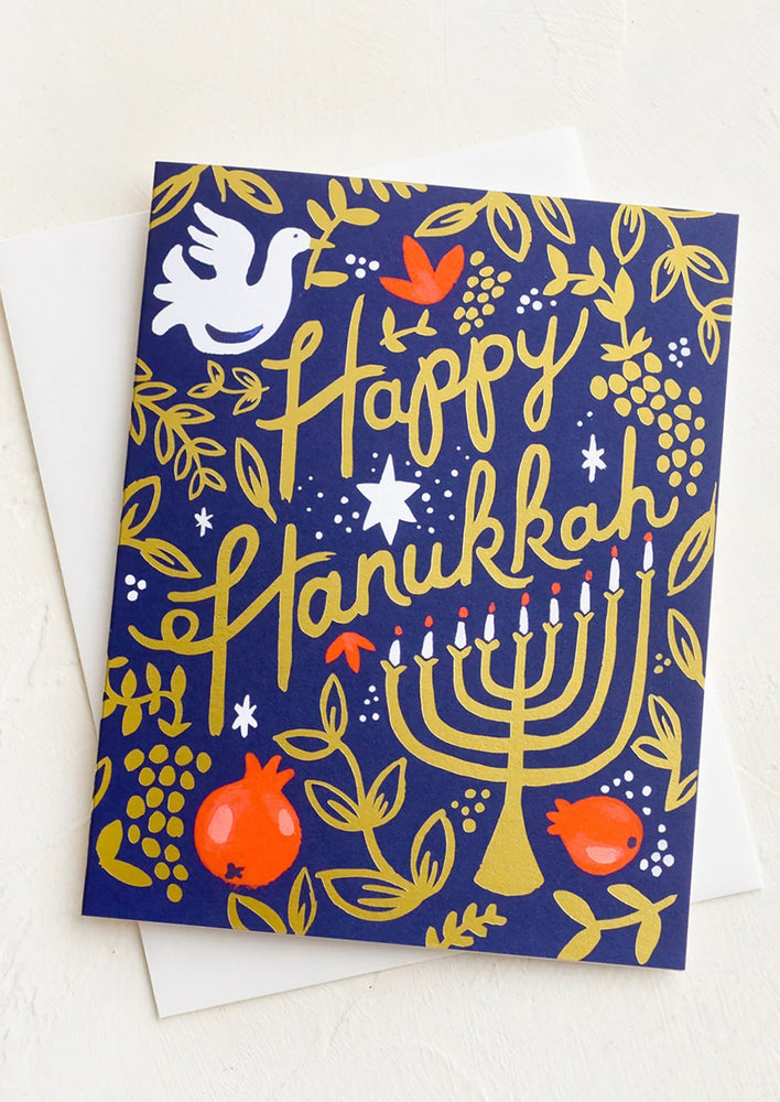 An illustrated greeting card with doves, pomegranates and menorah.