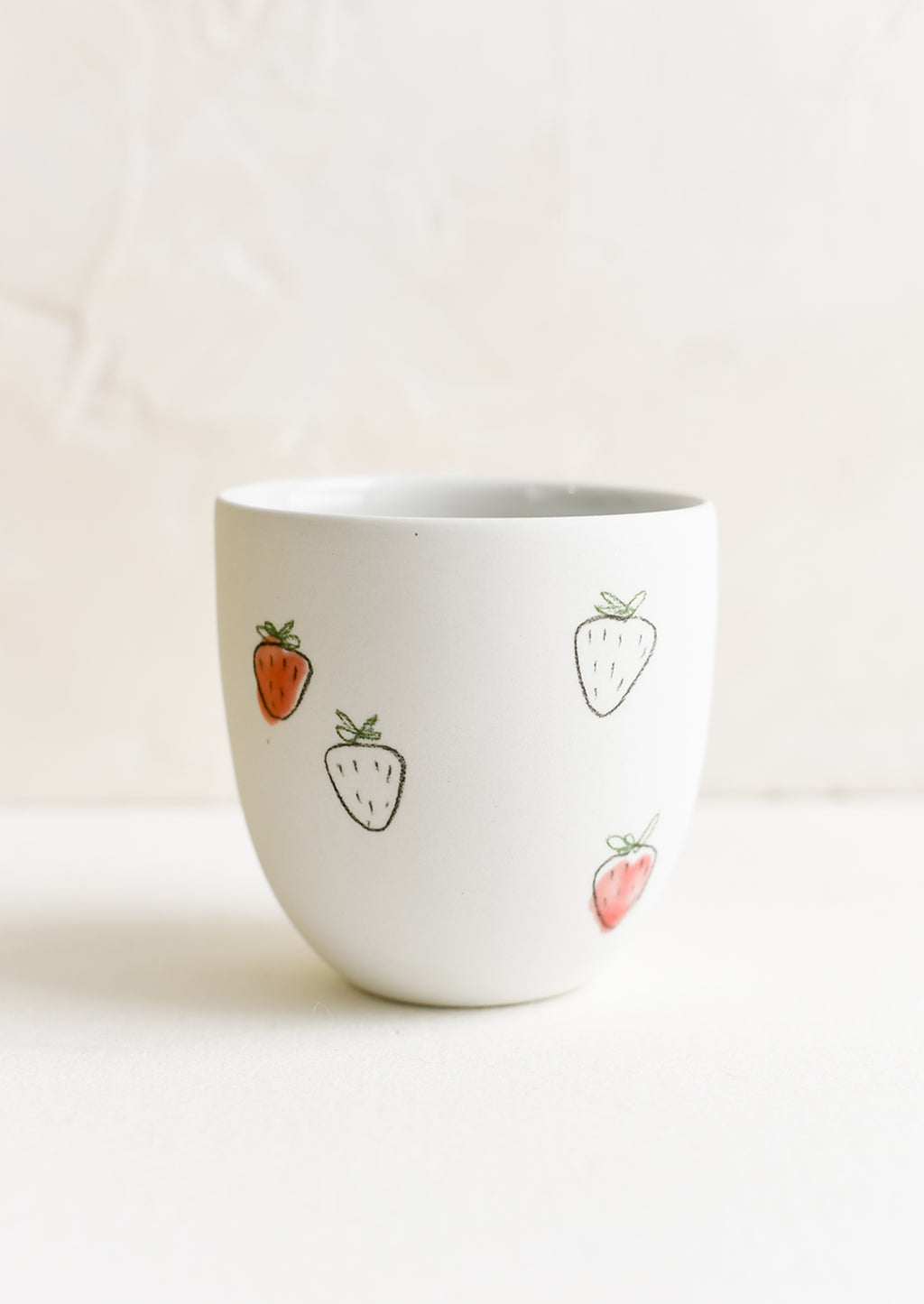 Small / Strawberry: A small porcelain cup with hand drawn strawberries.