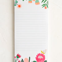 1: A list notepad with colorful botanical print.