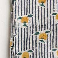 3: A block printed cotton napkin in stripe and floral pattern.