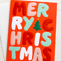 Single Card: A red card with red, white and green raised lettering reading "Merry Christmas".