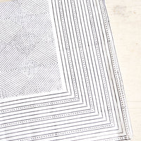 1: Black and white cotton tablecloth with geometric line and diamond print, displayed folded