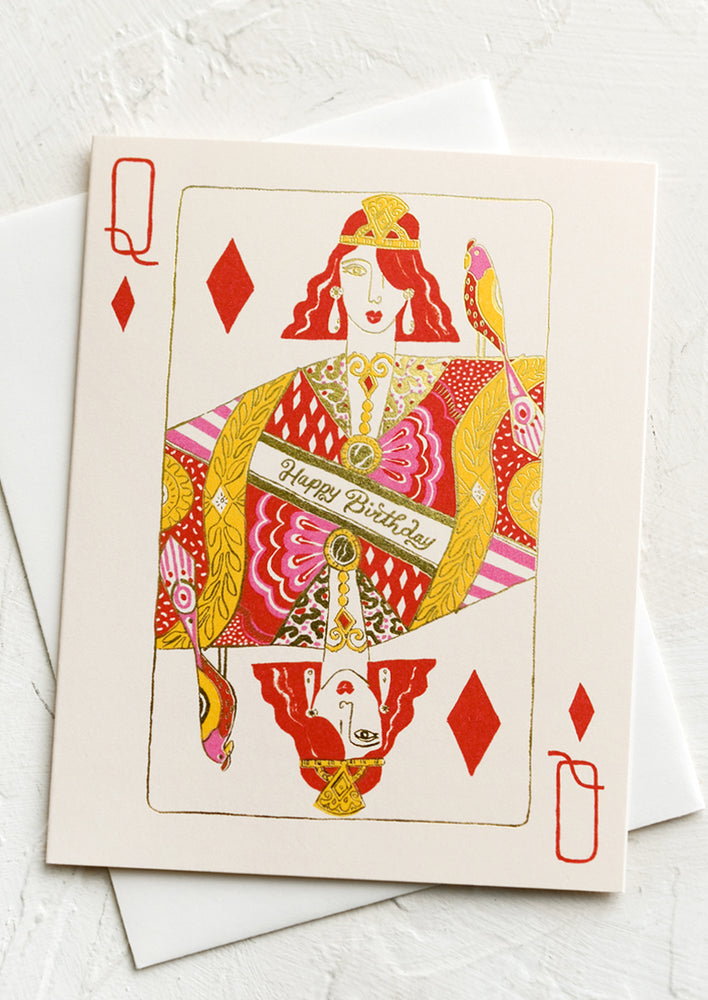 A greeting card with image of queen of diamonds playing card.