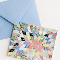 3: A card and envelope with quilt pattern.