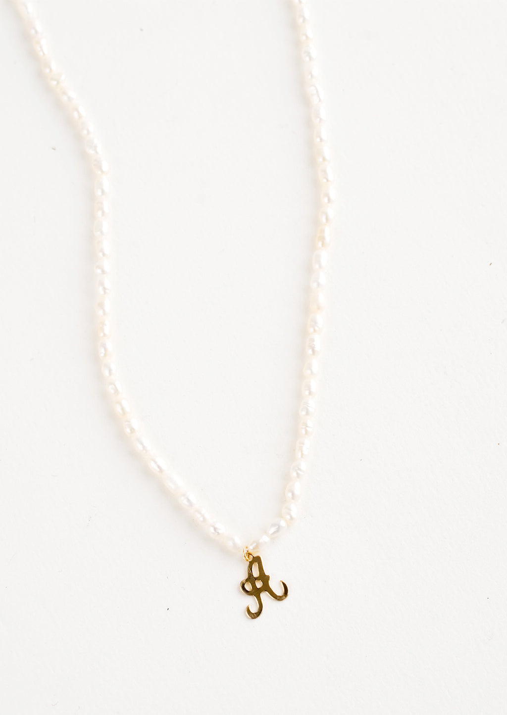 A: Quincy Pearl Initial Necklace