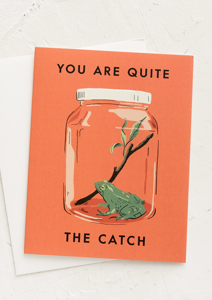 A card with image of frog in a jar, text reads "You are quite the catch".