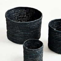 Extra Small / Black: Set of round catchall baskets made black raffia in three incremental sizes.