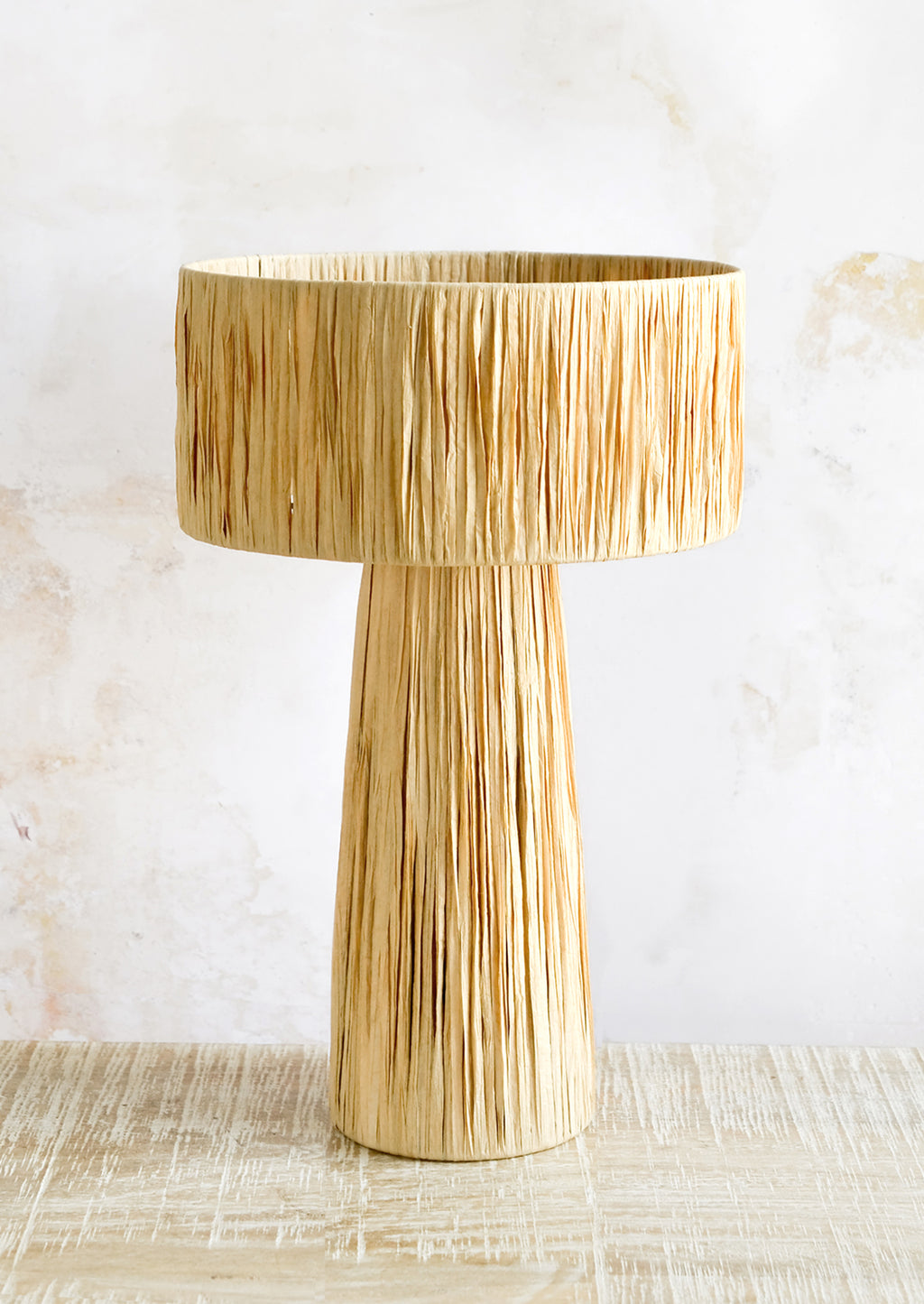 Natural: A table lamp wrapped in natural raffia.