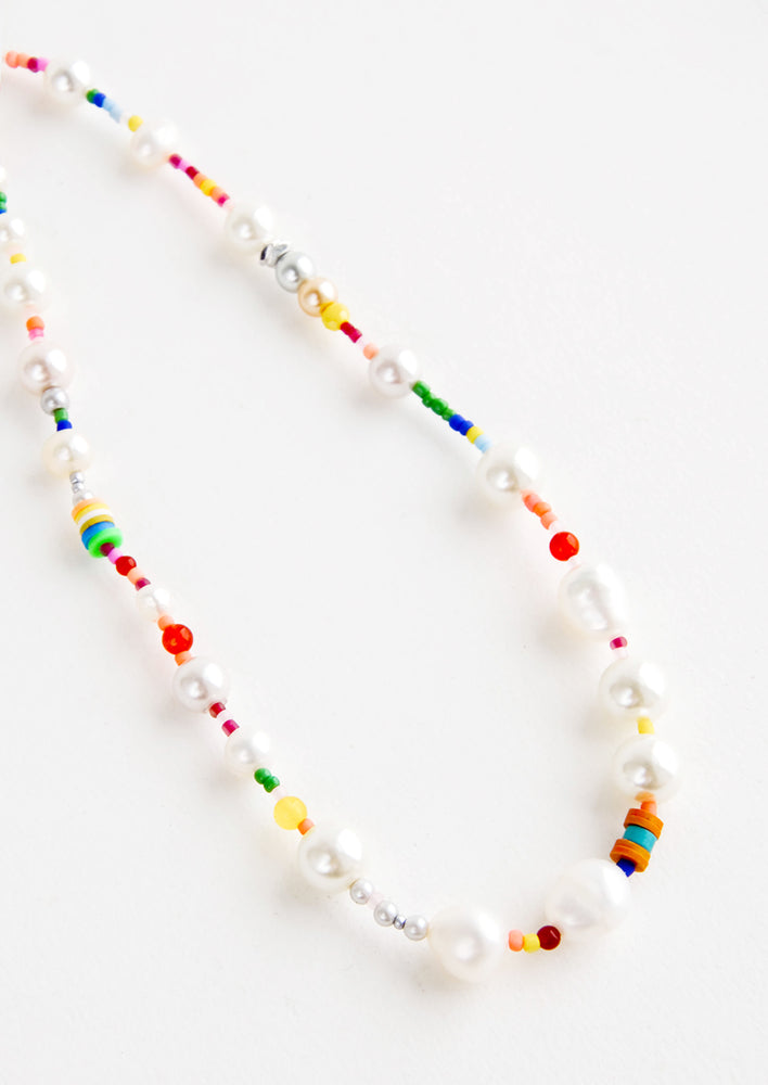 2: Mix of chunky pearl beads with rainbow colored beads on single strand necklace