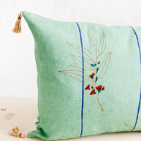 2: Decorative lumbar throw pillow with block printed floral and stripe print and jute tassels at corners
