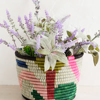 Brights Multi: A colorful woven planter basket with lavender plant.
