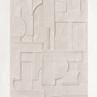 1: An art print featuring geometric cutout shapes of neutral paper, pieced together.