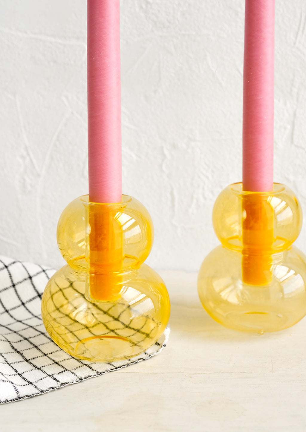 Honeycomb: A bubble shaped glass taper candle holder in honeycomb yellow-orange.