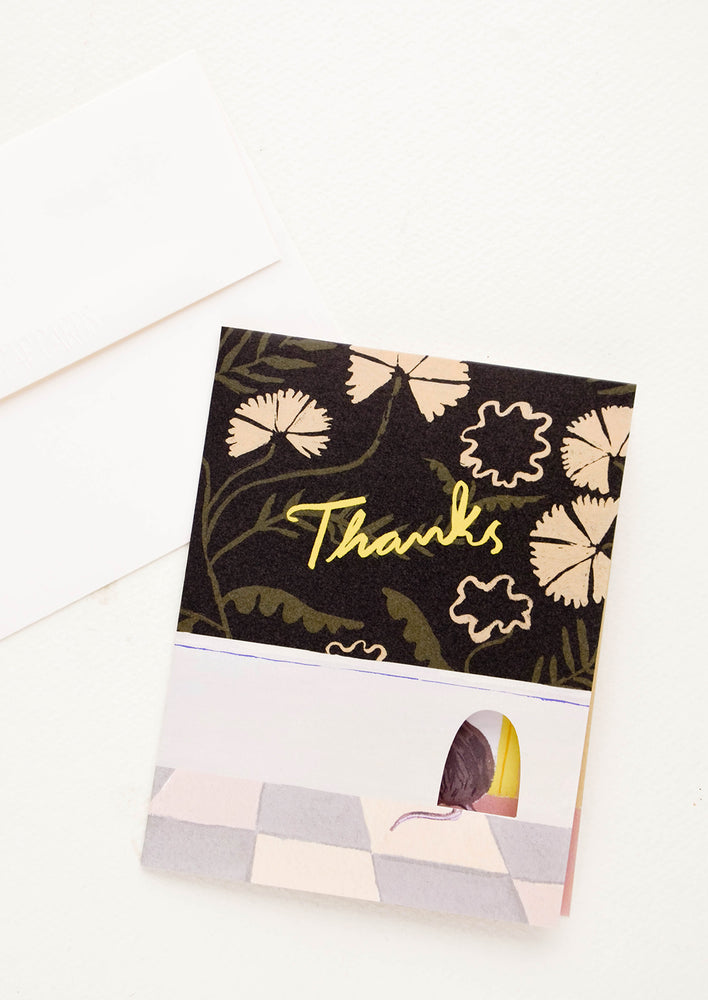 Greeting card with image of wall in a kitchen with a mouse hole, with "Thanks" in yellow text