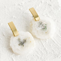 White Quartz: Pair of earrings with raw white quartz gemstone slice and rectangular brass posts.