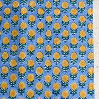 1: A blue and yellow floral block print placemat.