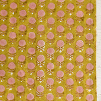 3: A pink and yellow floral block print placemat.