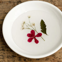 2: A pressed flower ring dish.