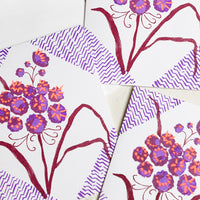 Plum Multi: A floral print card set in purple, wine and neon orange.