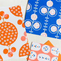 Neon Orange / Cobalt: A patterned risograph printed card set in cobalt and orange.