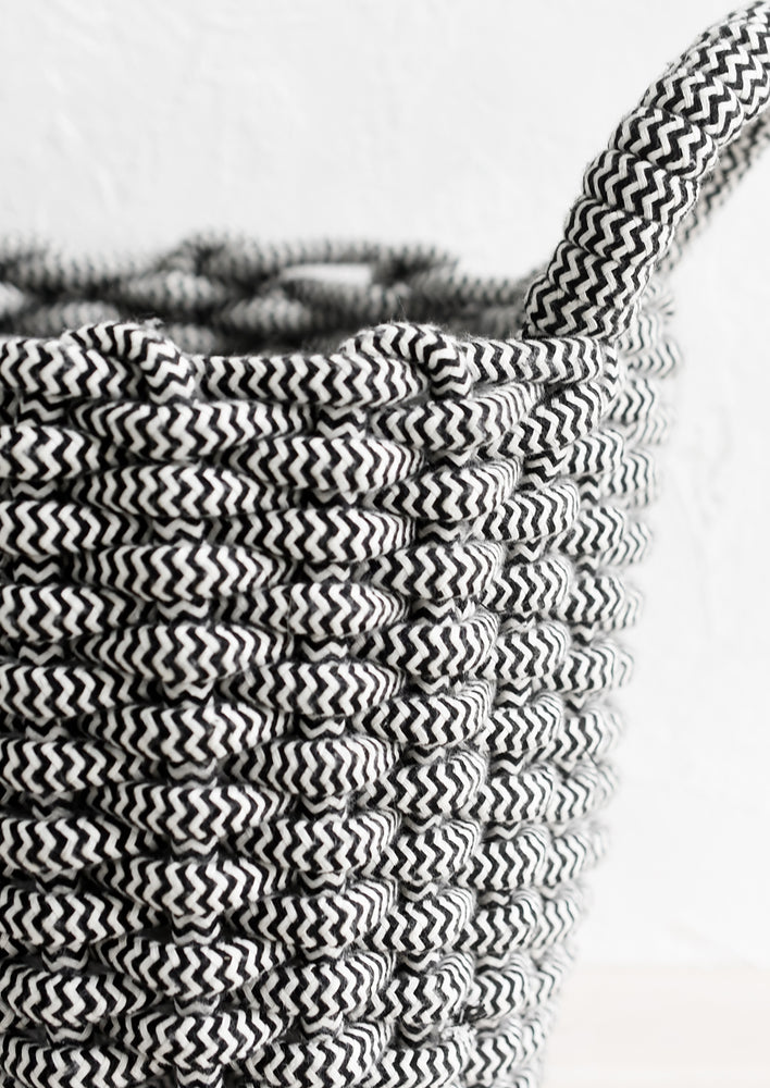 3: A cotton rope basket made with black and white zigzag pattern.