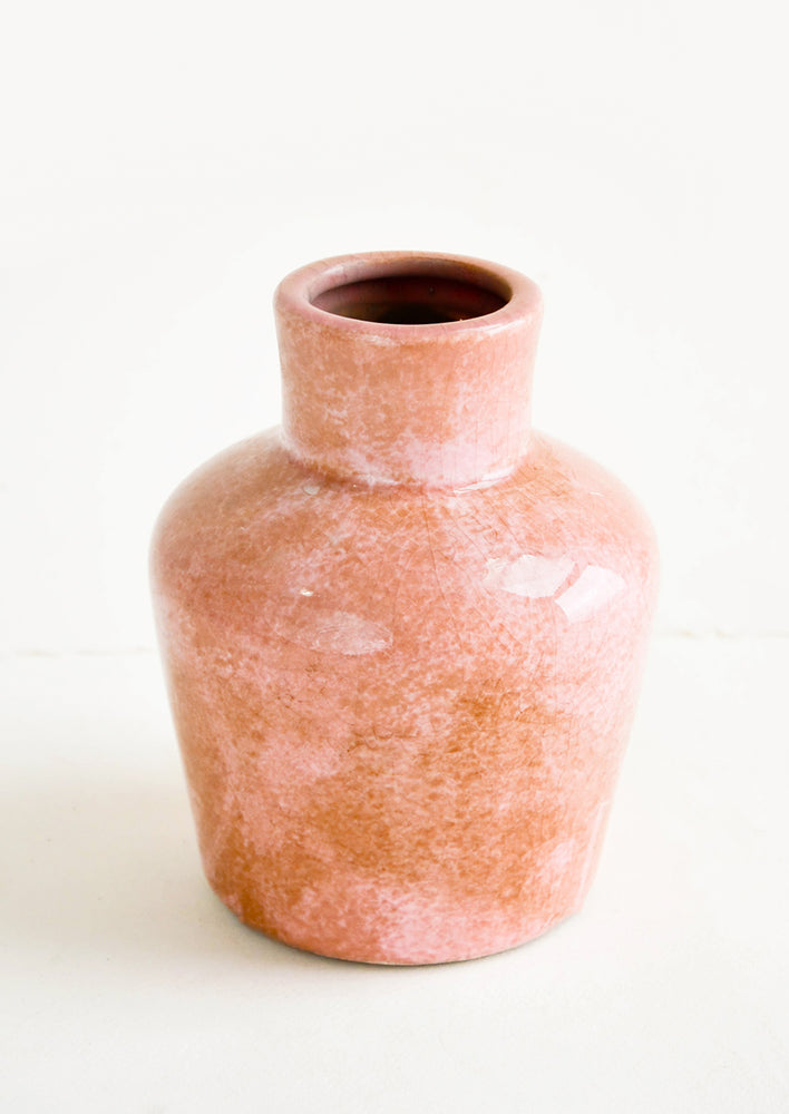 Ceramic vase in pink glossy glaze with subtle distressed, crackle effect