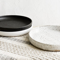 2: Stacked serving plates.