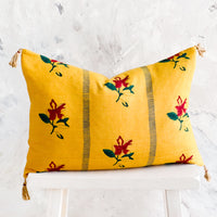 Mustard: Block printed lumbar pillow in mustard yellow fabric with red flowers