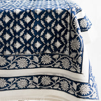 2: An indigo and white block printed tablecloth.