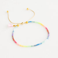 Rainbow Multi: Delicate bracelet of rainbow colored glass beads on a thin gold chain.