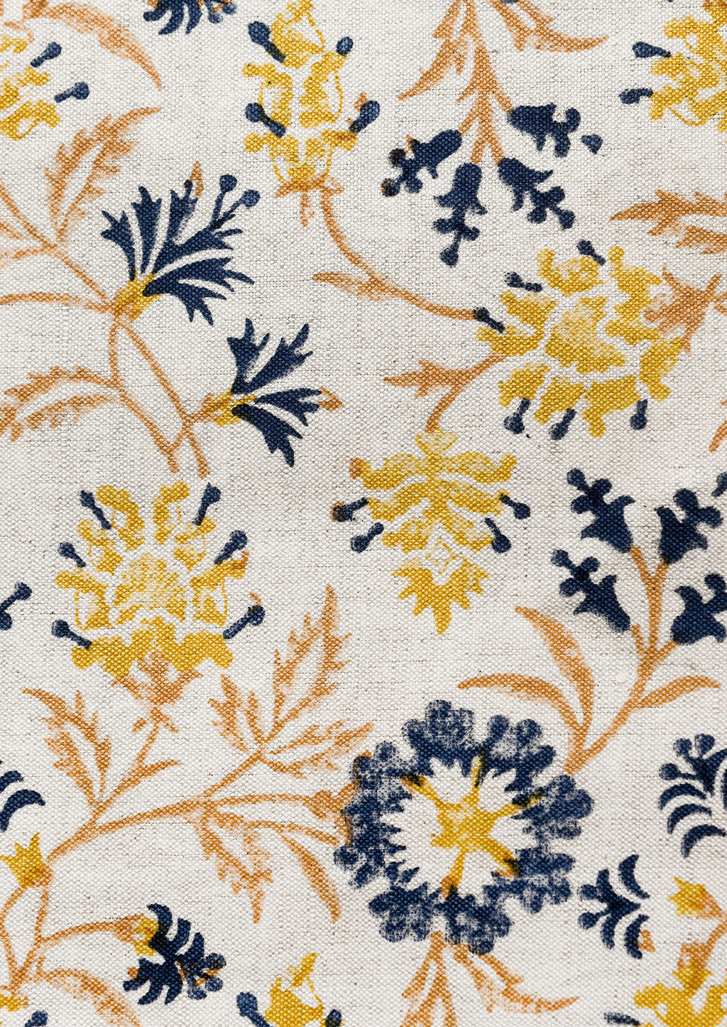 3: A block printed pillow in navy, brown and yellow floral print on natural linen.