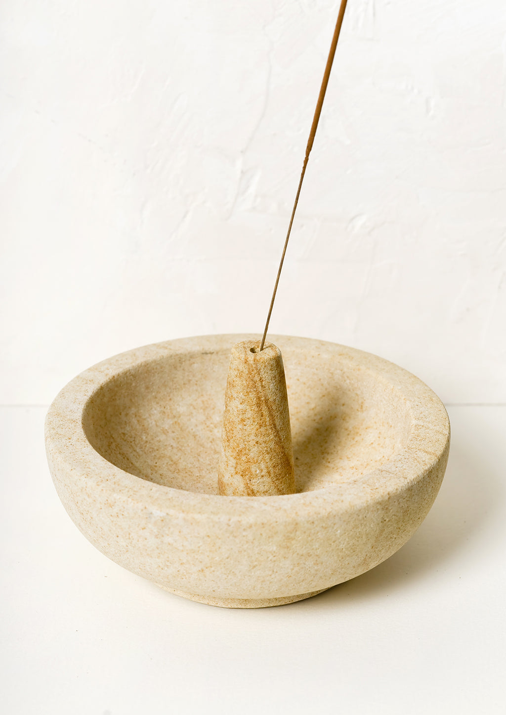 2: A sandstone incense burner with bowl for stick incense.