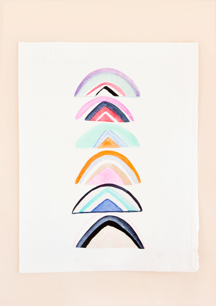 A stack of unconventional rainbows are shown in watercolor on a plain white background.