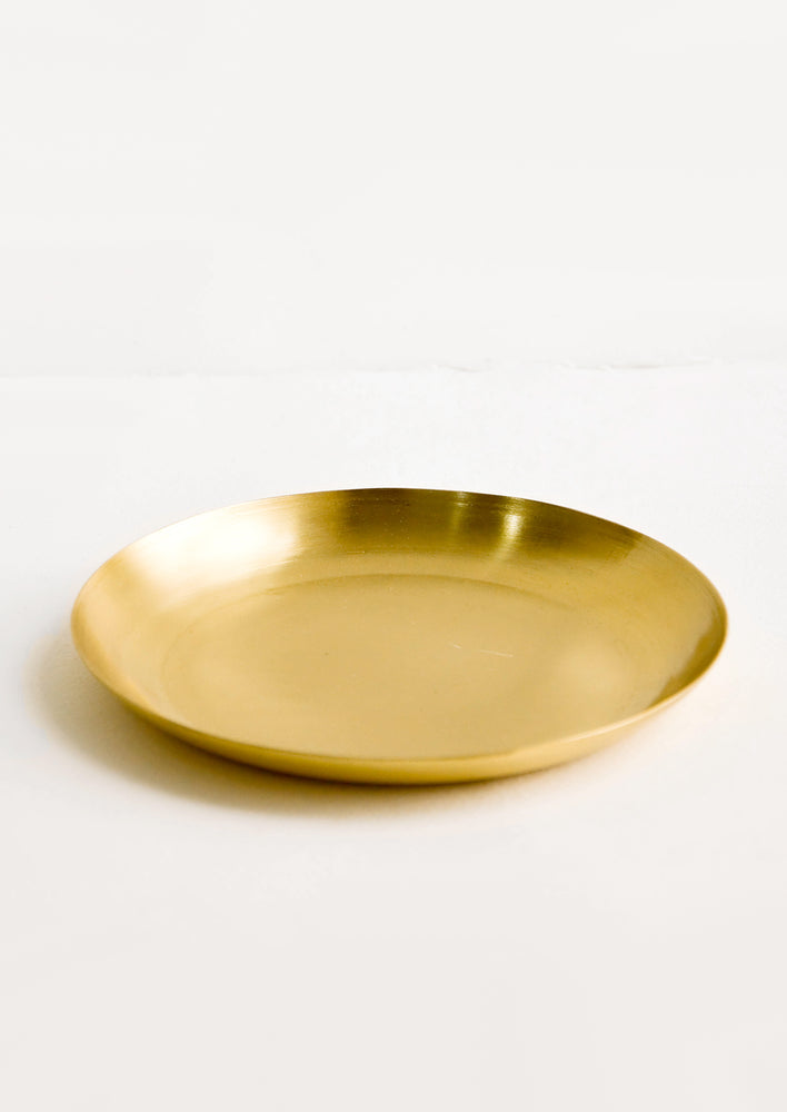 Round catchall tray in brushed satin brass