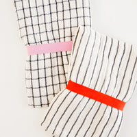 1: Gauzy cotton tea towel in white with black grid or stripes