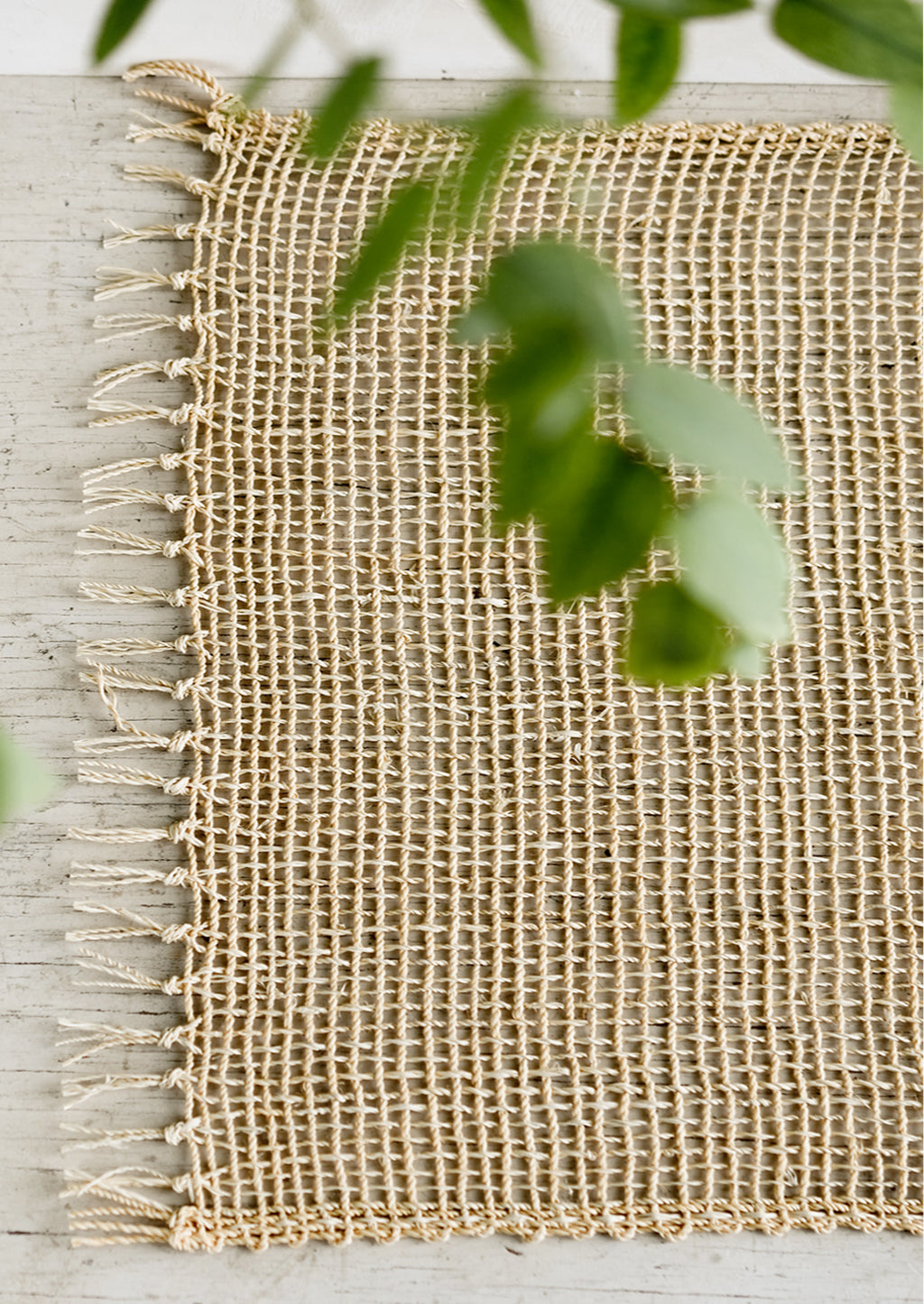 Natural: An open weave placemat made from natural straw.